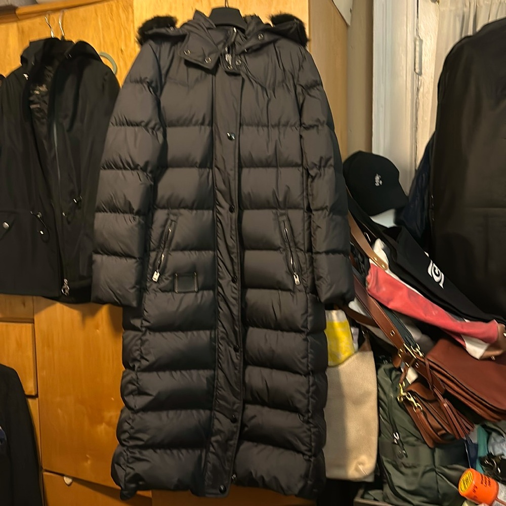 down coat,extra long,side opening with snaps.Snap still have plastic covers